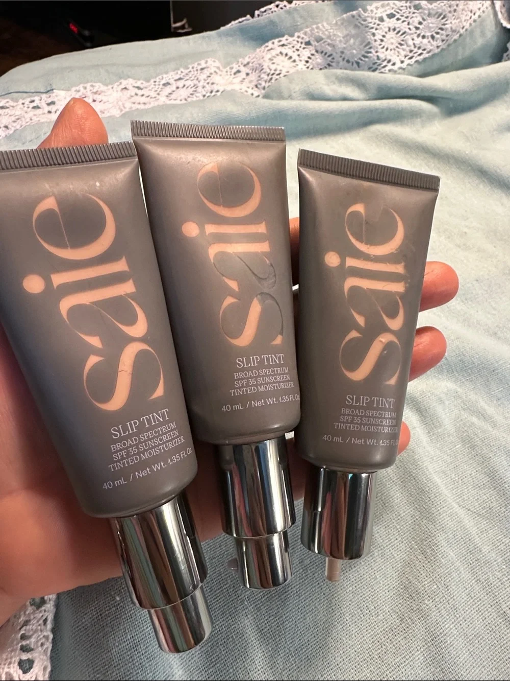 Saie Slip Tint Tinted Moisturizer Trio - Taupe & Rose Gold Accents